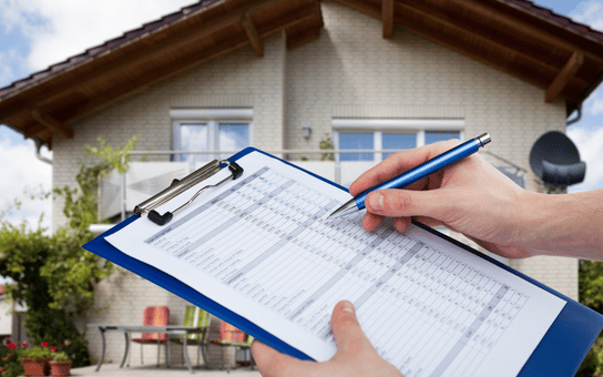 Field representative holding a clipboard