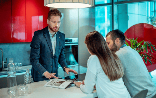 Sales representative meeting with a customer